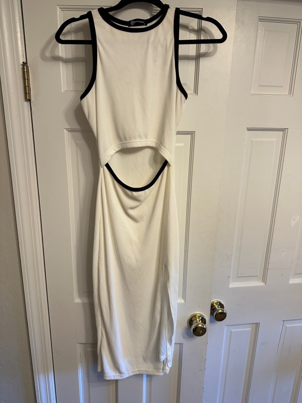 Sleeveless White Midi Dress with Black Trim and Cutout